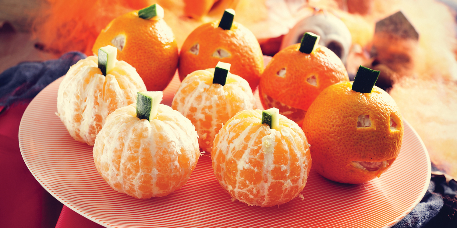 oranges made to look like pumpkins