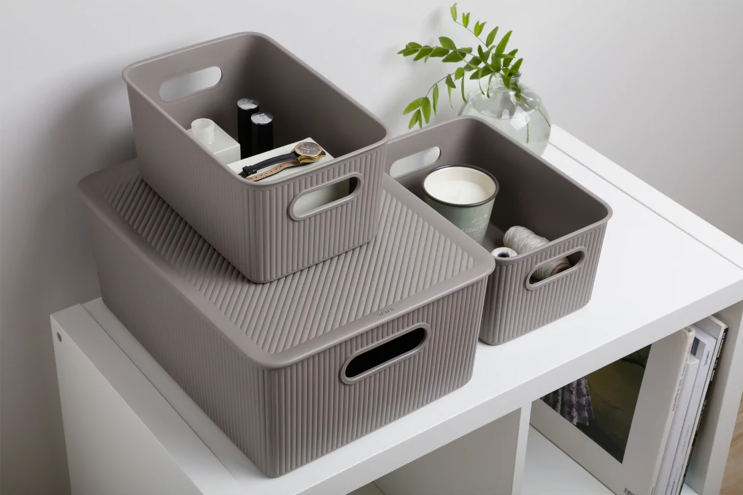 taupe baskets stacked on top of each other