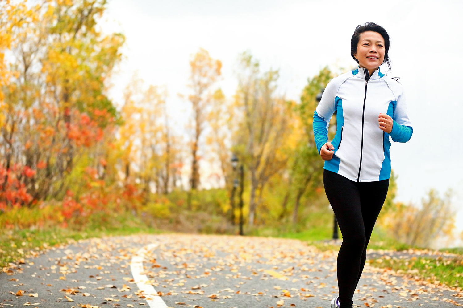 A middle-aged woman going for a healthy jog