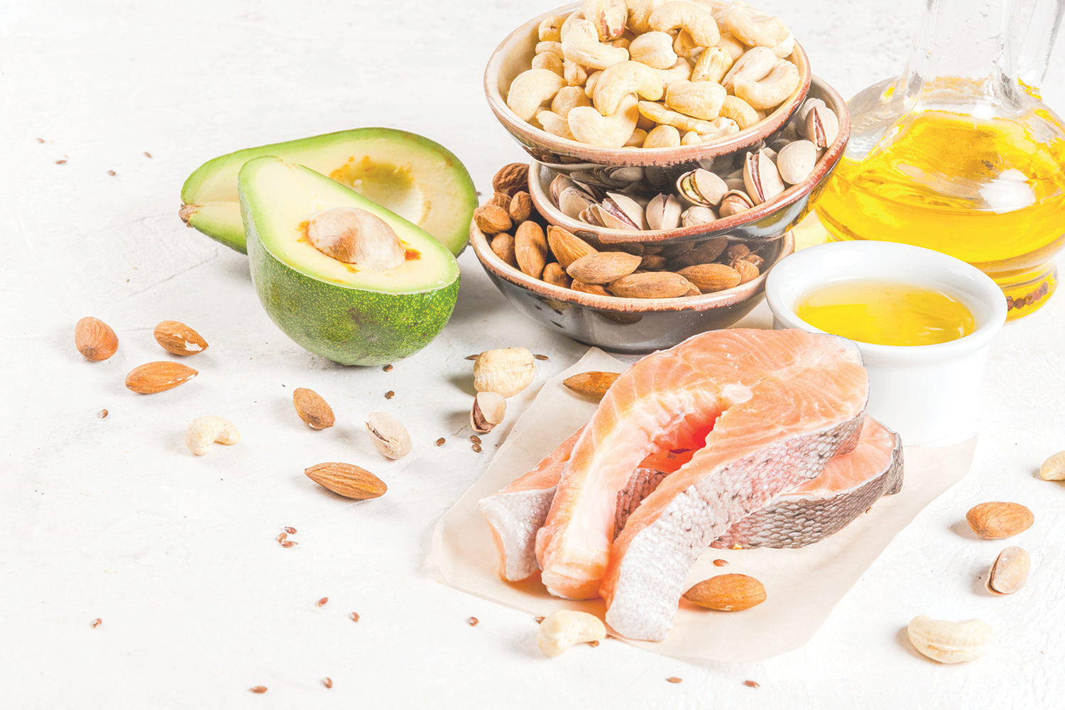 Foods full of healthy fats, like nuts, avocado, and salmon