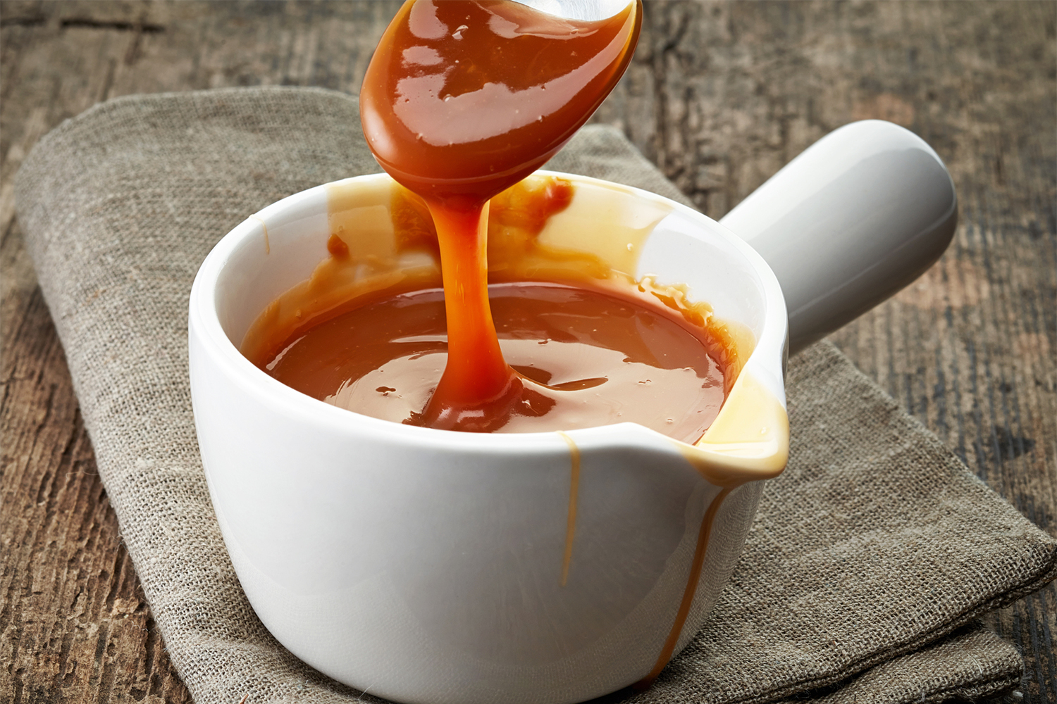 a dish of hot caramel sauce