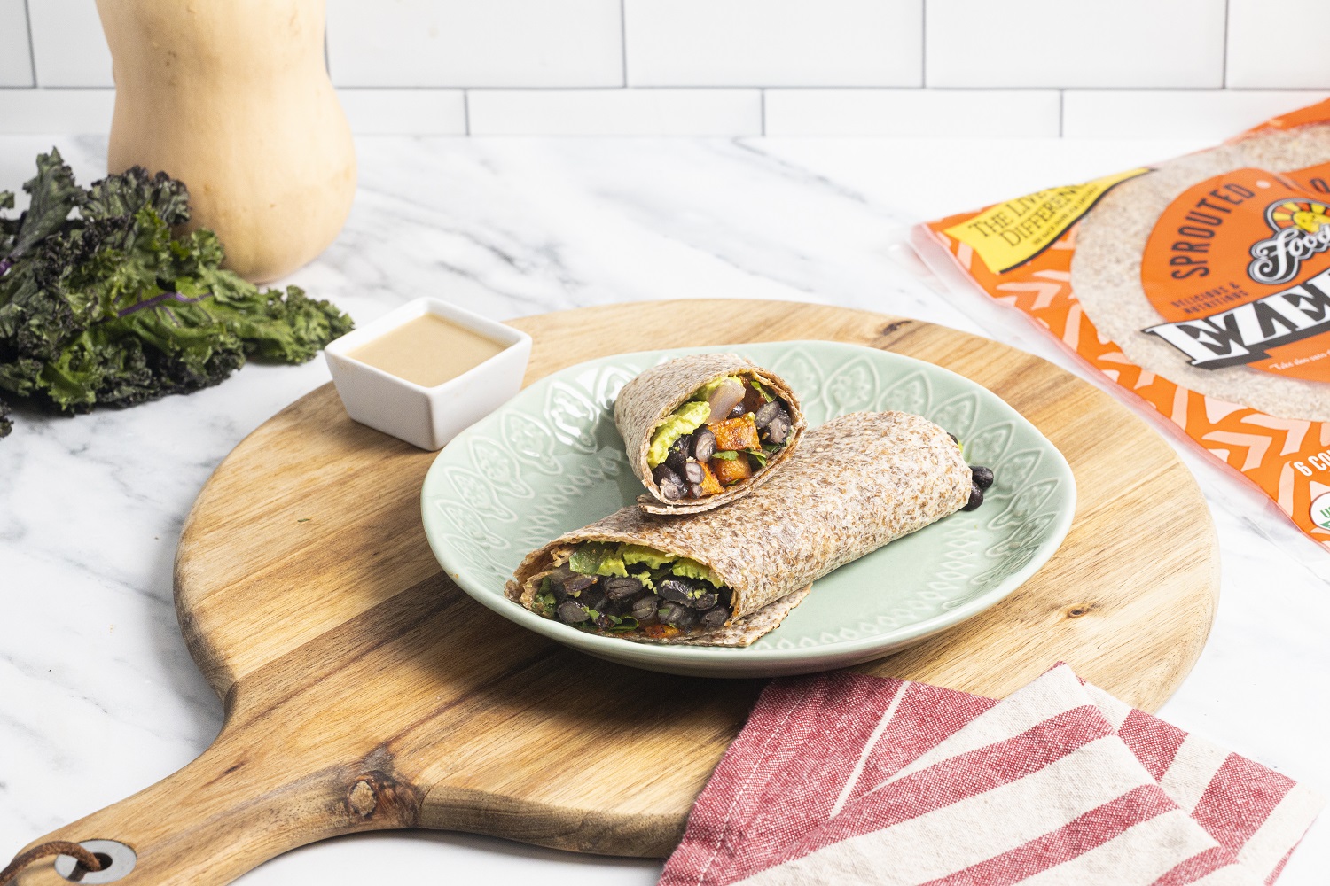 wrap sandwich on wooden cutting board