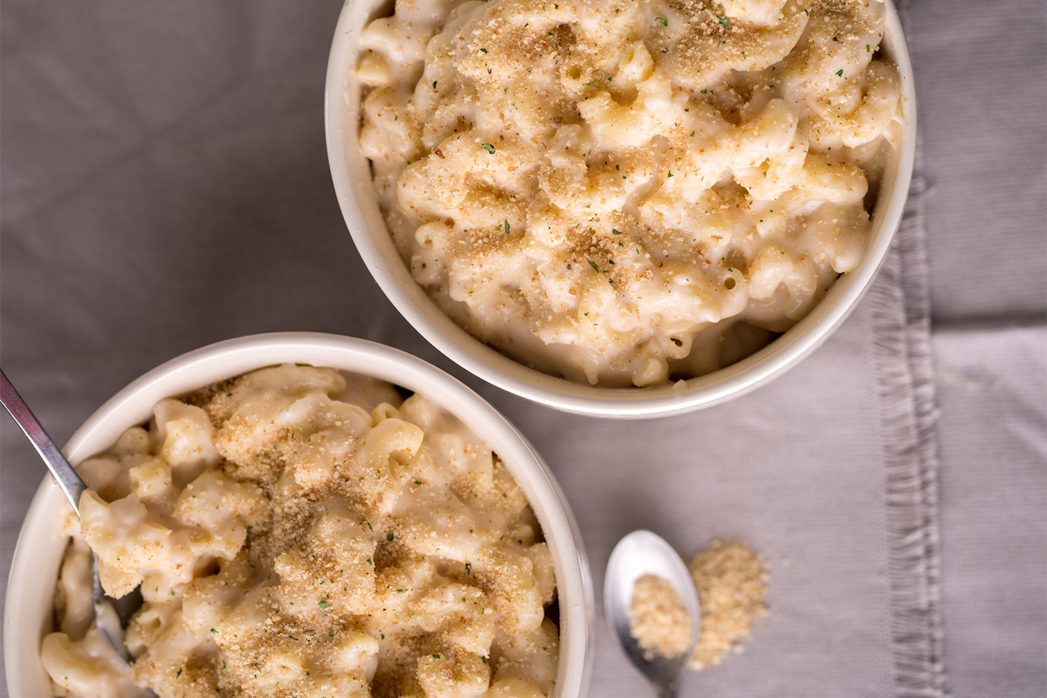 bowls of the creamiest mac and cheese I've ever seen