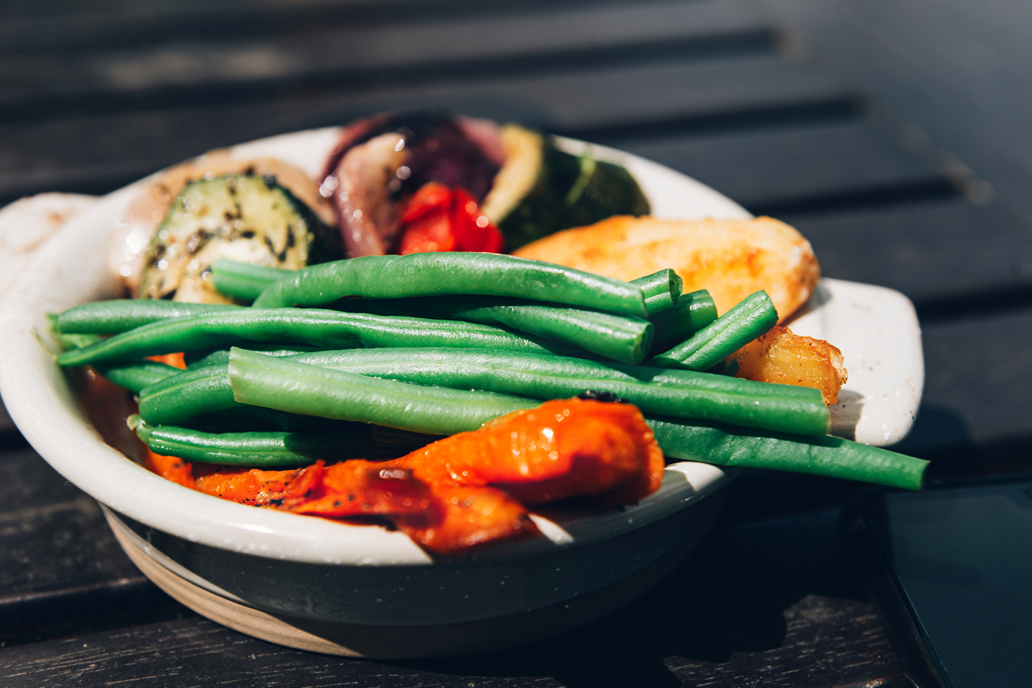 a bowl of parsnips and green beans