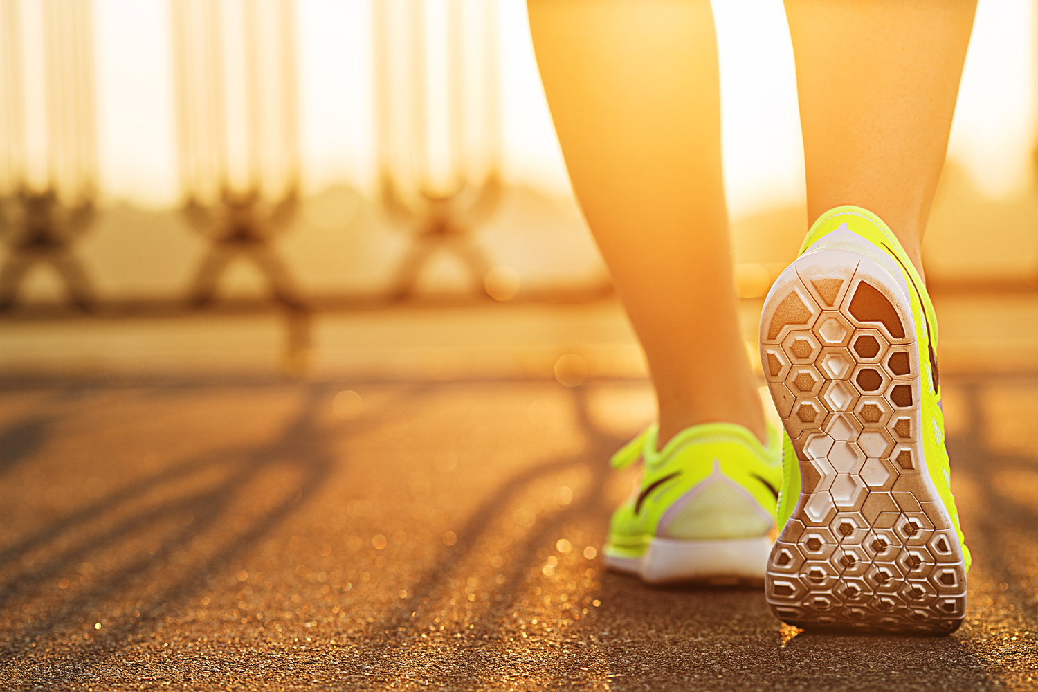 a close-up of a woman's running shoes