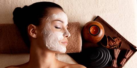 a woman relaxing with a facial mask