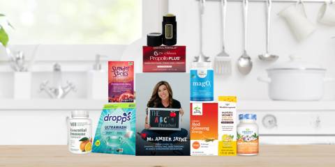 a collection of immune supplements, energy sources, and a book about preschool