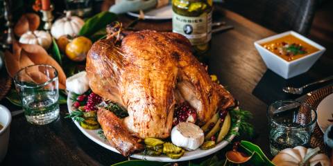 a roast turkey and a jar of pickles