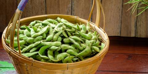 Fresh edamame in a basket.