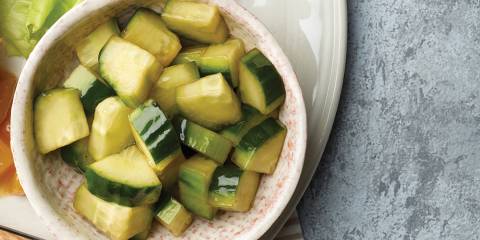 Top view of Cucumber Vinegar Salad in a white bowl.