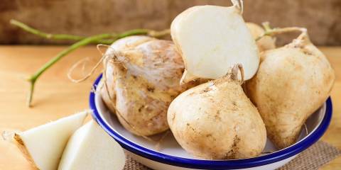 a bowl of jicama ready to be chopped