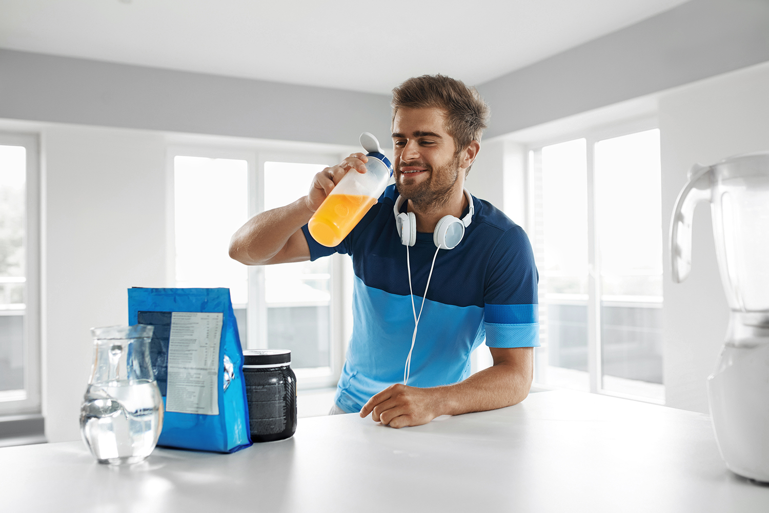 a man drinking supplements mixed in water